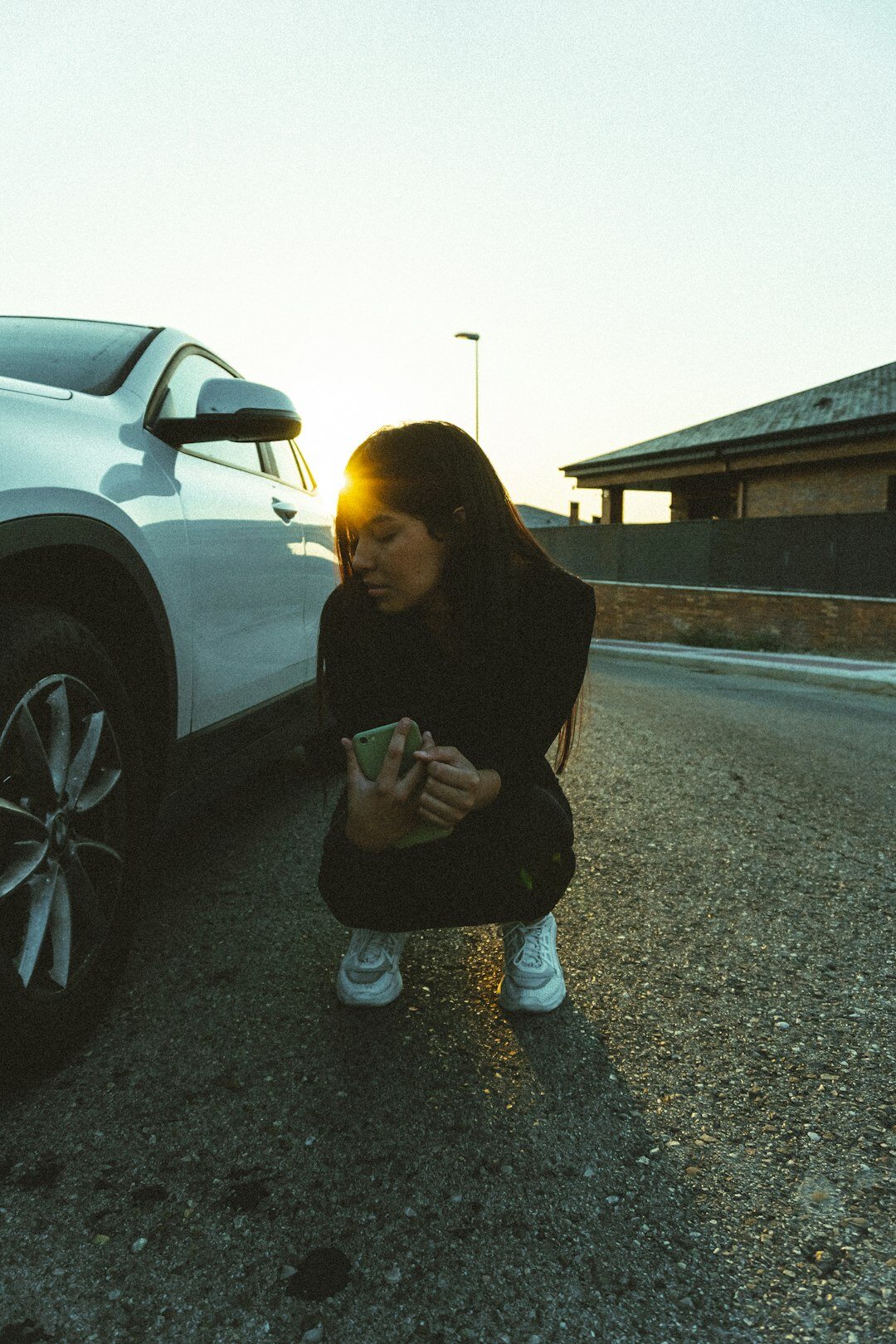 person comparing car models online
