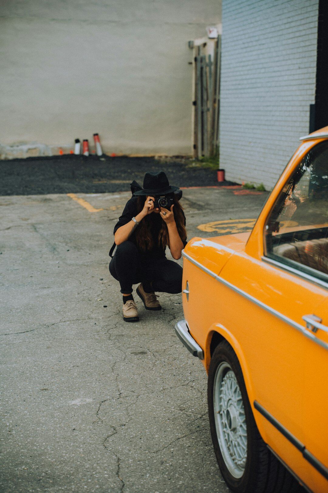 person taking car photos for sale