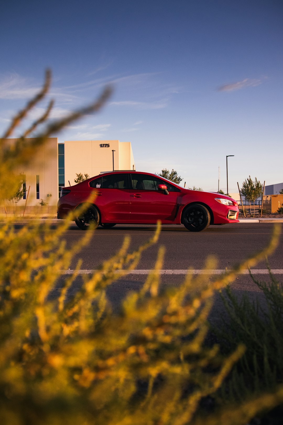 red sports car on highway